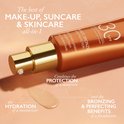 Lancaster Infinite Bronze getinte crème met pompje en een druppel crème, met tekst over hydratatie en dekking.