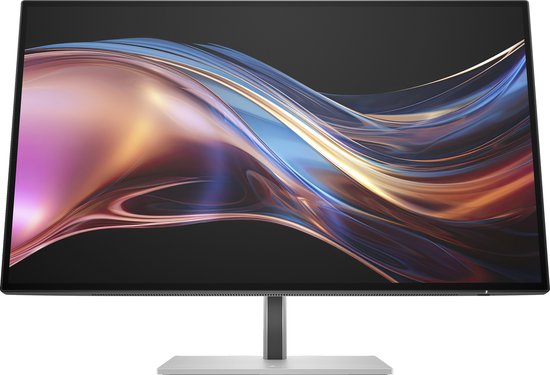 Monitor met een abstracte, kleurrijke weergave op het scherm, geplaatst op een zilverkleurige vierkante voet.