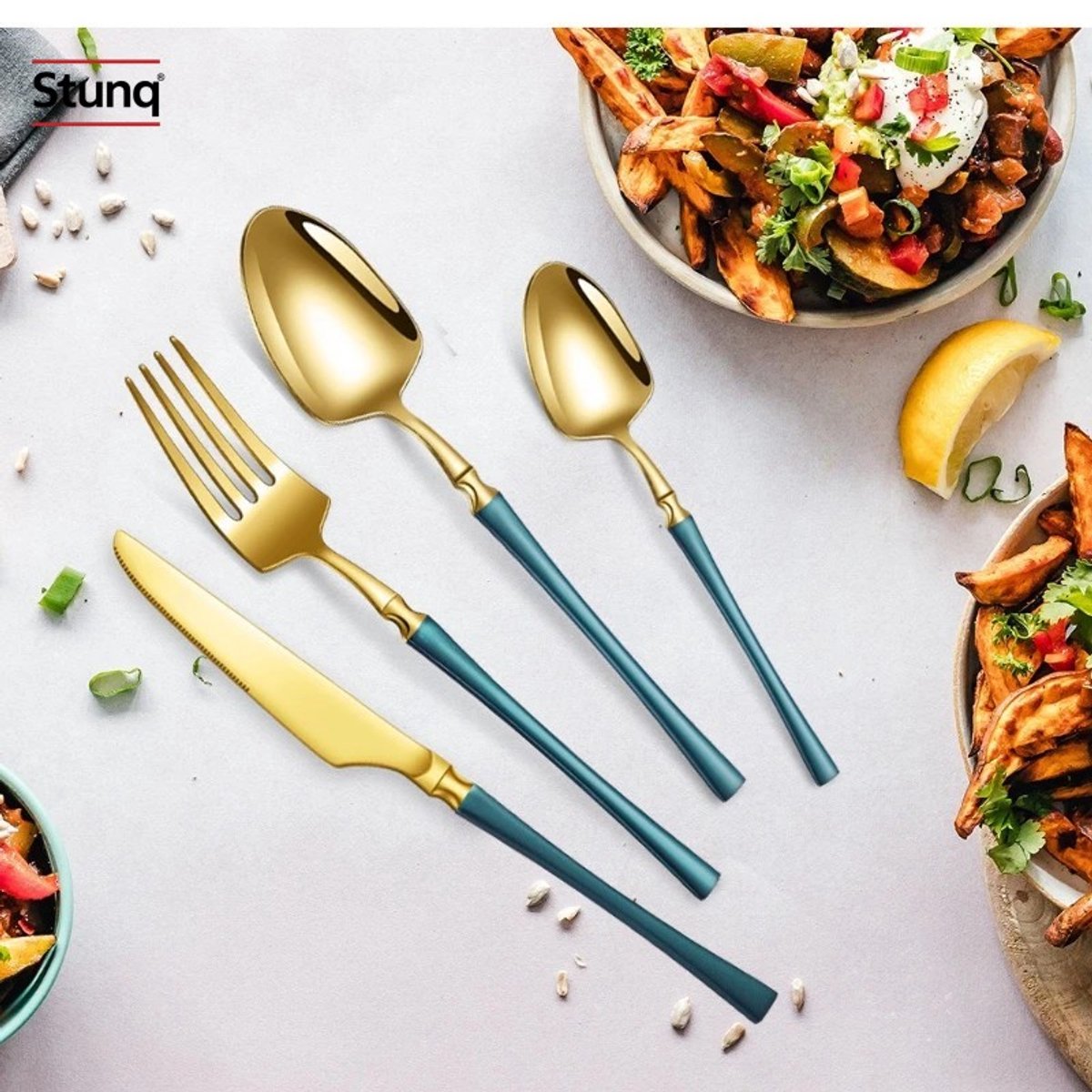 Stunq® 24-delige RVS bestekset, matgoud met blauwe handvatten