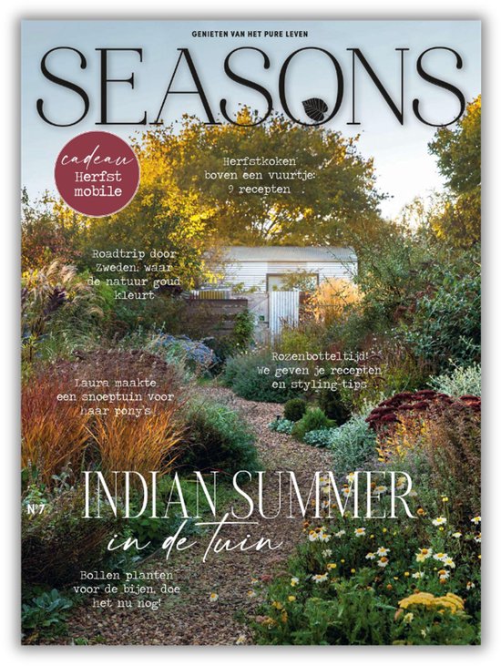 Seasons magazine met de titel 'Indian Summer in de Tuin' in goudkleurige letters. De cover toont een herfsttuin met kleurrijke planten en bomen.