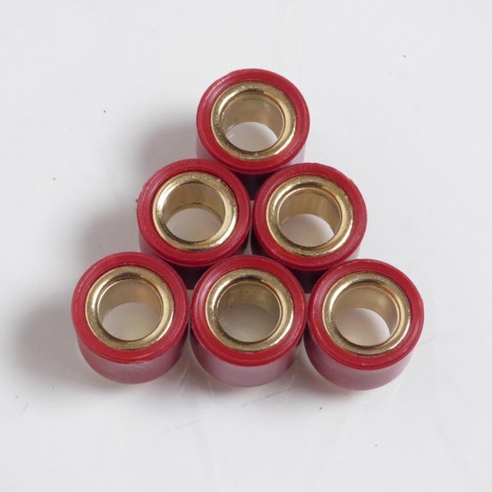 Six galets de variateur rouges avec bagues dorées, disposés en pyramide.