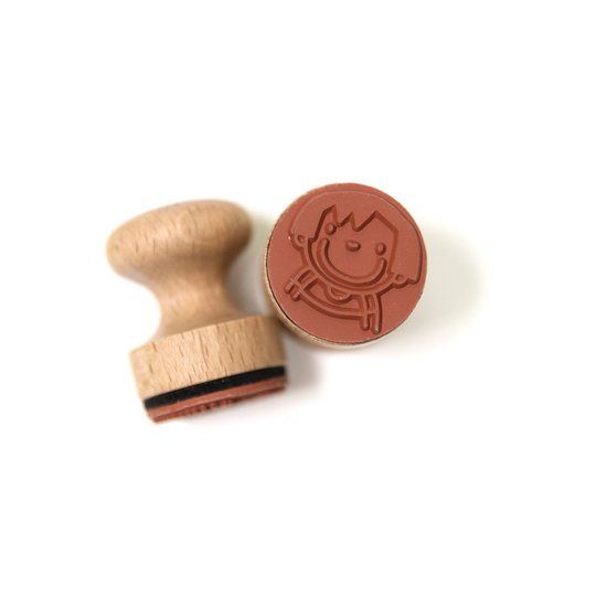 Houten stempel met een roodbruine rubberen onderkant voorzien van een gravure van het personage Anna.