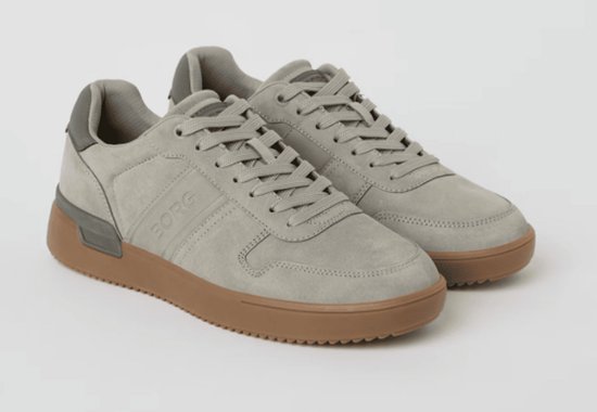 Grijze Björn Borg sneakers met bruine zool, detail op de hiel en logo op de zijkant.
