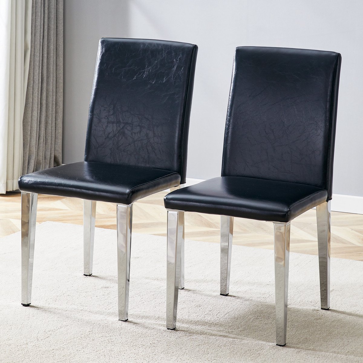 [Set van 2 minimalistische eetkamerstoelen] Europese lichtgewicht luxe in zwart en zilver: zwart PU-leer + zilverkleurige metalen poten, past perfect in moderne eetkamers, woonkamers en meer.