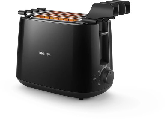Zwarte Philips broodrooster met gloeiende verwarmingselementen en broodroosteropzetstukken.