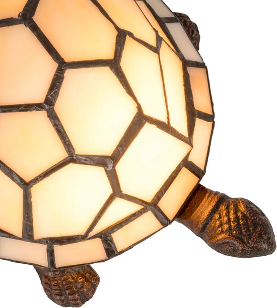 Glazen schildpadlamp met crème-witte panelen en een bruin, gedetailleerd onderstel.