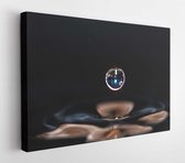 Canvas schilderij - Water drop creating waves and ripples in on a dark grey background  -     361872479 - 50*40 Horizontal