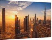 Skyline van Dubai met de Burj Khalifa bij zonsopgang - Foto op Canvas - 90 x 60 cm