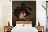 Behang - Fotobehang Tronie van een man met gevederde baret - Rembrandt van Rijn - Breedte 205 cm x hoogte 280 cm
