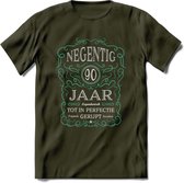 90 Jaar Legendarisch Gerijpt T-Shirt | Aqua - Grijs | Grappig Verjaardag en Feest Cadeau Shirt | Dames - Heren - Unisex | Tshirt Kleding Kado | - Leger Groen - L
