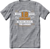 12 Jaar Legend T-Shirt | Goud - Wit | Grappig Verjaardag en Feest Cadeau Shirt | Dames - Heren - Unisex | Tshirt Kleding Kado | - Donker Grijs - Gemaleerd - XL