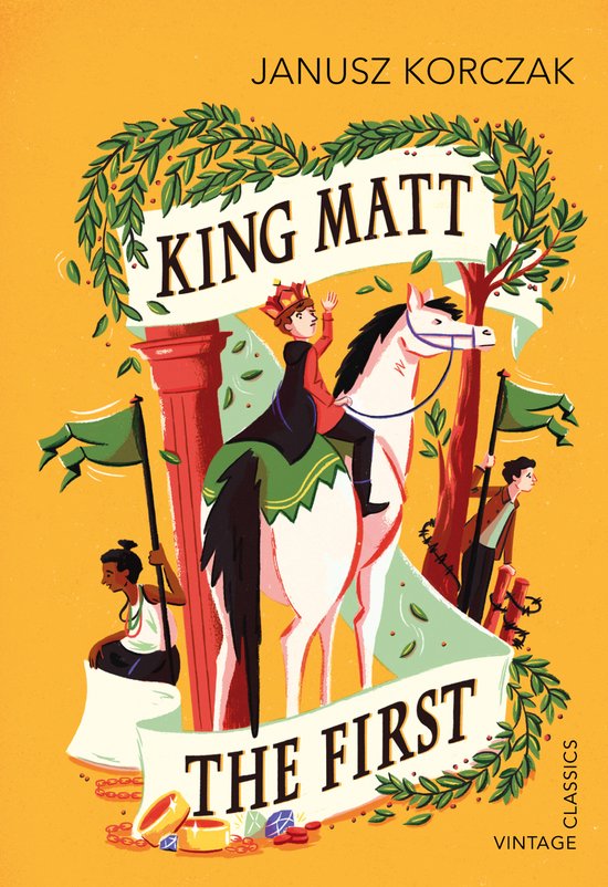 Boekomslag van "King Matt The First" met een jongen op een paard, omringd door bladeren en vlaggen.