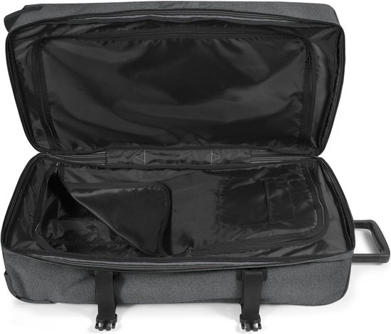 Open donkergrijze Eastpak reiskoffer met zwarte binnenvoering en vakken.