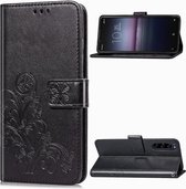 Voor Sony Xperia 1 II vierbladige gesp reliëf gesp PU lederen tas met lanyard & kaartsleuf & portemonnee & houder (zwart)