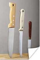 Poster Couteaux dans une planche à découper 60x90 cm - Tirage photo sur Poster (décoration murale salon / chambre)