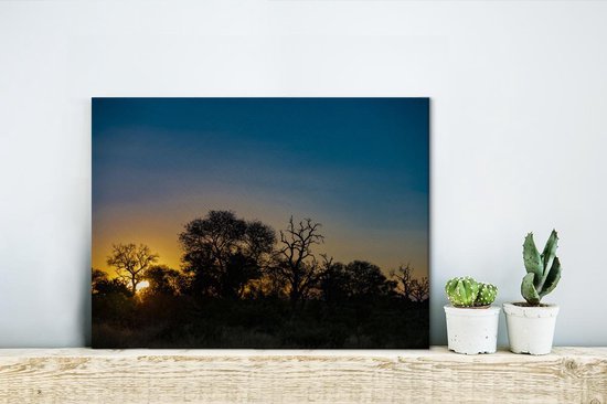 Canvas Schilderij Silhouet van bomen bij zonsondergang in Krugerpark Zuid-Afrika - 40x30 cm - Wanddecoratie