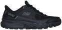 Zwarte Skechers heren sneaker, zijaanzicht. Met het 'Skechers Slip-Ins' logo op de zijkant.