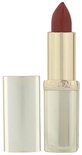 Gouden huls met een matte bruinrode lipstick punt. De zilveren dop ligt ernaast.