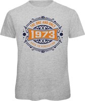1973 The One And Only | Feest Kado T-Shirt Heren - Dames | Donker Blauw - Goud | Perfect Verjaardag Cadeau Shirt | Grappige Spreuken - Zinnen - Teksten | Maat L