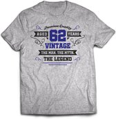 62 Jaar Legend - Feest kado T-Shirt Heren / Dames - Antraciet Grijs / Donker Blauw - Perfect Verjaardag Cadeau Shirt - grappige Spreuken, Zinnen en Teksten. Maat XL