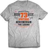 73 Jaar Legend - Feest kado T-Shirt Heren / Dames - Antraciet Grijs / Oranje - Perfect Verjaardag Cadeau Shirt - grappige Spreuken, Zinnen en Teksten. Maat S
