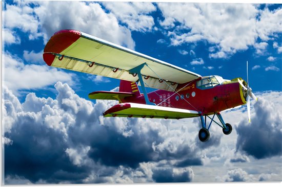 WallClassics - Acrylglas - Rood/Geel Vliegtuig in Wolkenvelden - 60x40 cm Foto op Acrylglas (Met Ophangsysteem)
