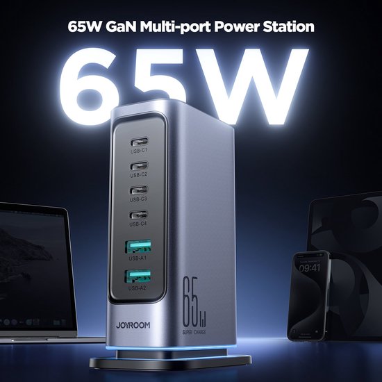 Joyroom 65W multi-poort oplader met 6 poorten, naast een laptop, tablet en smartphone.