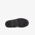 Zool van een zwarte Skechers laars met ster-profiel.