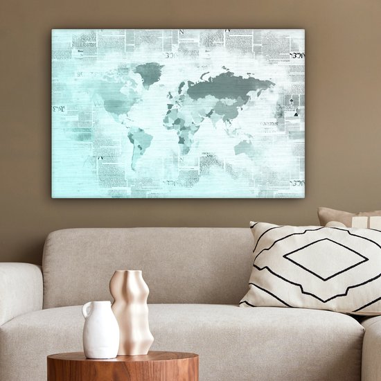 Wereldkaart aux couleurs bleu clair sur fond de papier journal 60x40 cm