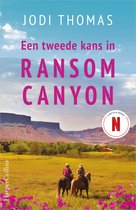 Boekcover van 'Een tweede kans in Ransom Canyon' van Jodi Thomas, met twee ruiters te paard in een landschap.