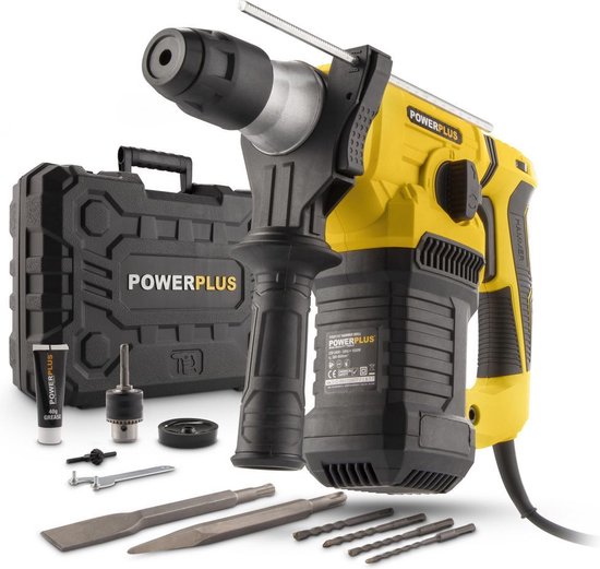 Powerplus klopboormachine met accessoires in zwarte koffer: gele boormachine, boortjes, beitels, vet en steeksleutel.