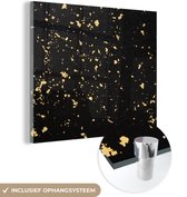 MuchoWow® Glasschilderij 90x90 cm - Schilderij acrylglas - Gouden vlokken op een zwarte achtergrond - Foto op glas - Schilderijen