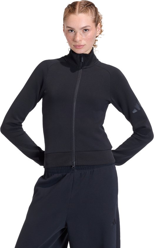 Veste de sport noire zippée, col montant et trois bandes sur la manche.