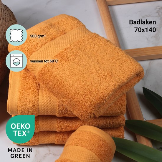 Pile de serviettes ocre avec icônes 500 g/m2 et lavage à 60°C.