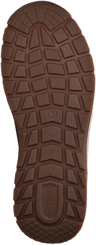 Buitenzool van een bruine sneaker.