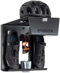 Zwarte Stasdock fietsbeugel met zwarte fietsschoenen, oranje fietsbril en CO2 patronen.