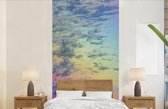 Behang - Fotobehang Wolken met een regenboog - Breedte 120 cm x hoogte 240 cm