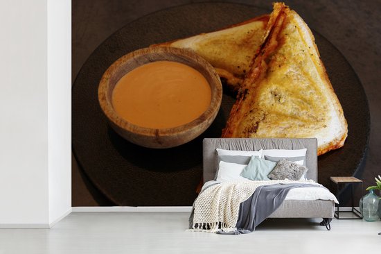 Toasti avec du jambon et du fromage et un fond d' fotobehang sauce épicée