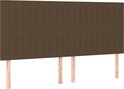 Tête de lit marron foncé rembourrée avec coutures verticales et supports en bois.