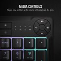 Detailopname van de media- en volumeknoppen op een zwart toetsenbord met RGB-verlichting.