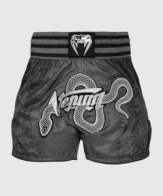 Donkergrijze Muay Thai shorts voor dames met slangenprint, Venum logo en cobra afbeelding op de voorkant.
