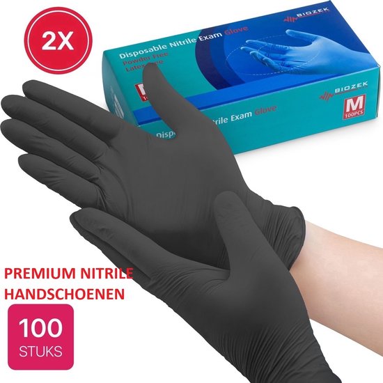 Une paire de gants en nitrile noirs premium à côté d'une boîte de 100 pièces.