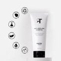 Witte tube RevitalTrax Anti-Hair Loss Shampoo staat naast vijf cirkelvormige iconen: Paraben-, Sulfaat-, Silicone-, Vegan-, Alcohol- en Cruelty-Free.