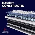 Exploded view van een gaming toetsenbord, toont de 5-laagse gasket constructie voor gedempt toetsgeluid.