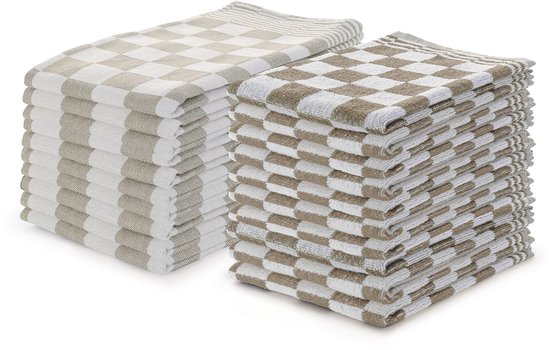 Detail van een beige en witte keukendoek met dambordpatroon en Linnick label.