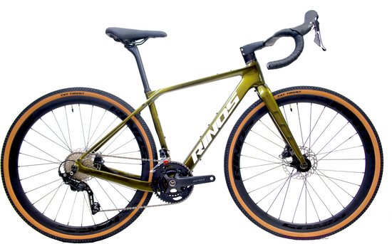 Volledige groene Rinos gravelfiets met bruine banden.