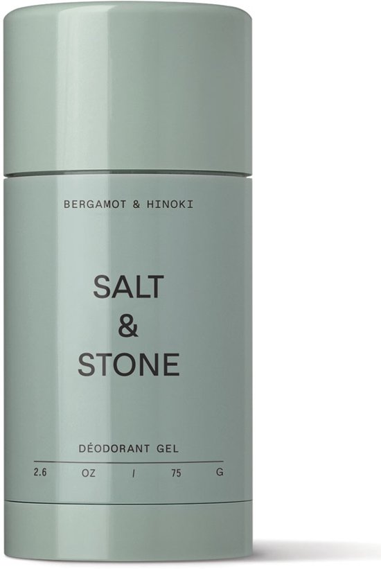 Lichtgroene deodorantstick van Salt & Stone met de tekst "BERGAMOT & HINOKI SALT & STONE DÉODORANT GEL 2.6 OZ 75 G".