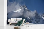Behang - Fotobehang Pasterze-gletsjer omringt door wolken in het Nationale Park Hohe Tauern - Breedte 360 cm x hoogte 240 cm