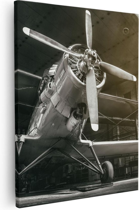 Artaza - Canvas Schilderij - Oud Vliegtuig In Een Hangar - Zwart Wit - 80x100 - Groot - Foto Op Canvas - Canvas Print