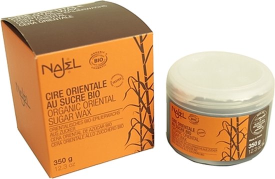 Oranje doosje en potje met Najel Oosterse biologische suikerwax. Afbeelding van suikerriet op de verpakking.